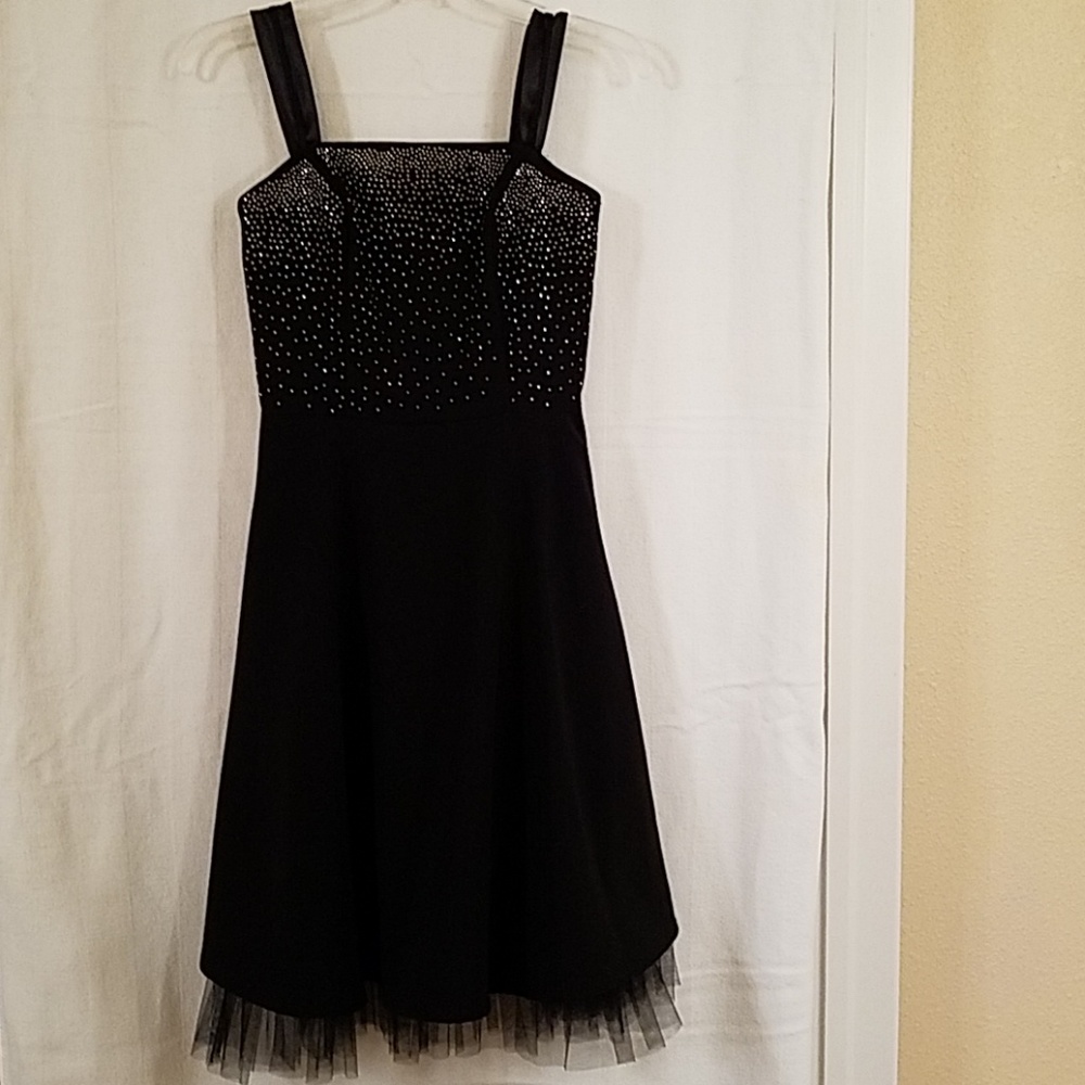 Classy dress. 58% rayon, 39% poly, 3% span